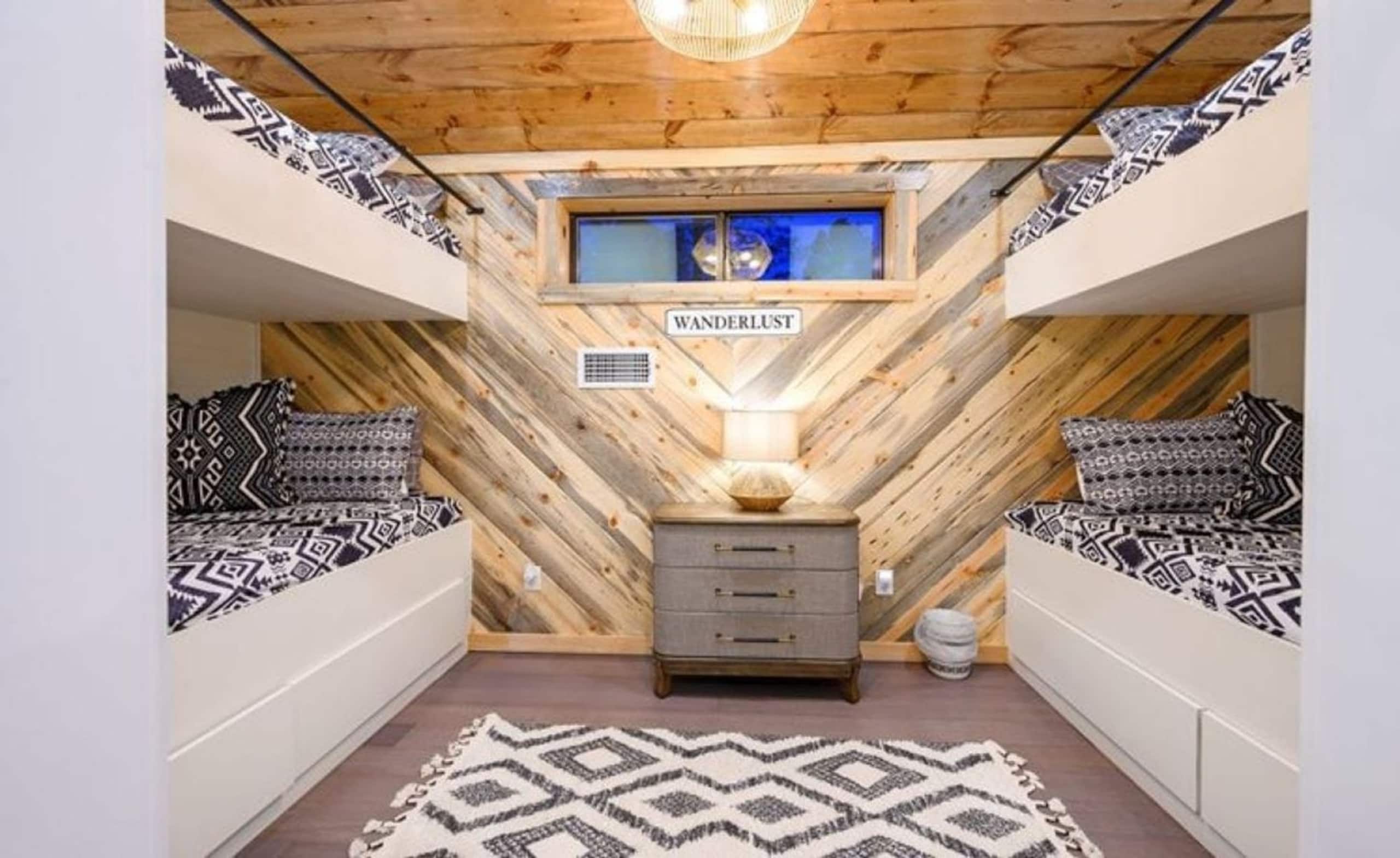 Bunk room at Sublime Retreat with four built-in Twin XL bunks and a diagonal wood-plank wall